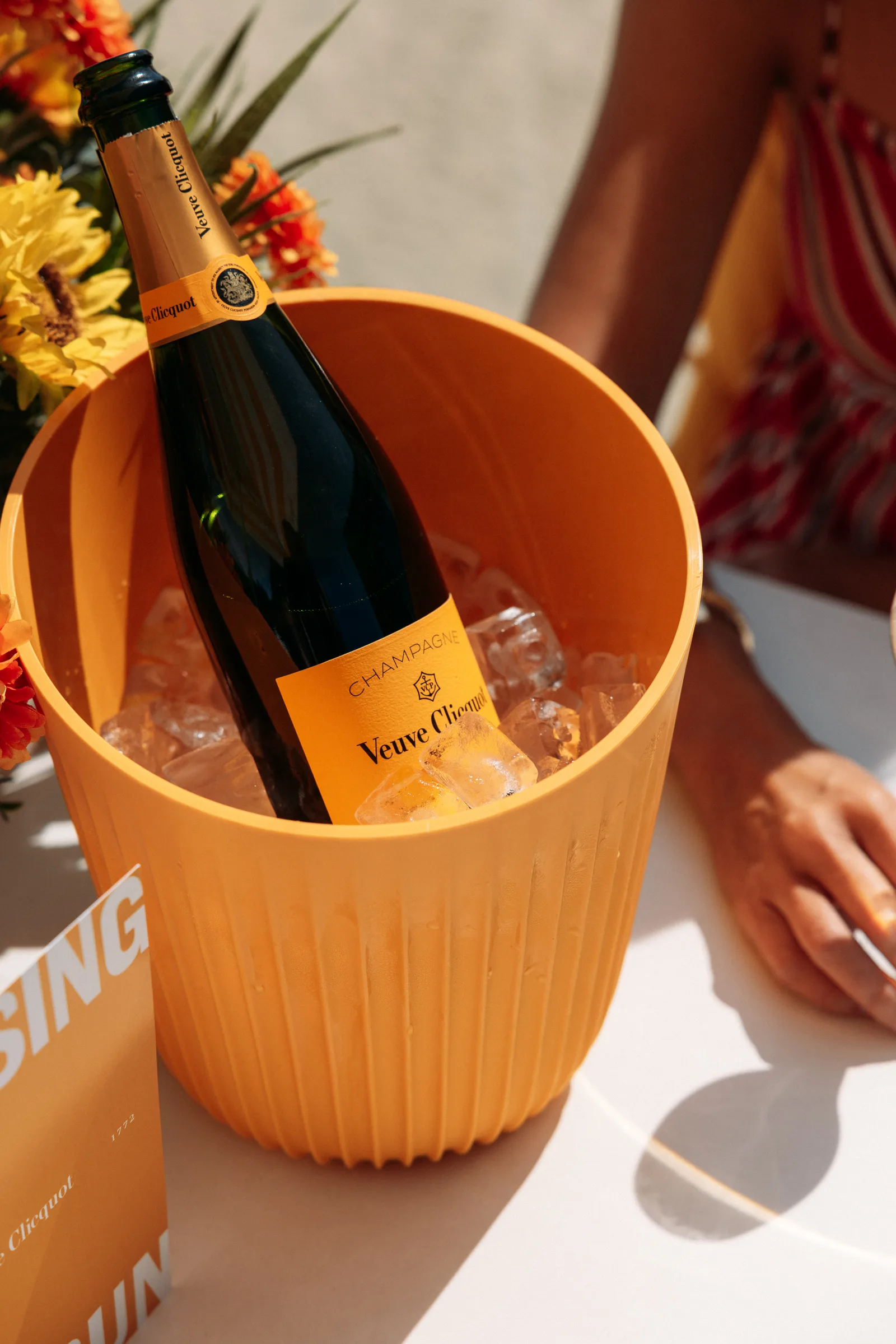 A Veuve Clicquot champagne bottle at Carbis Bay Beach Club, photographed for a Carbis Bay Collection content library shoot in Cornwall