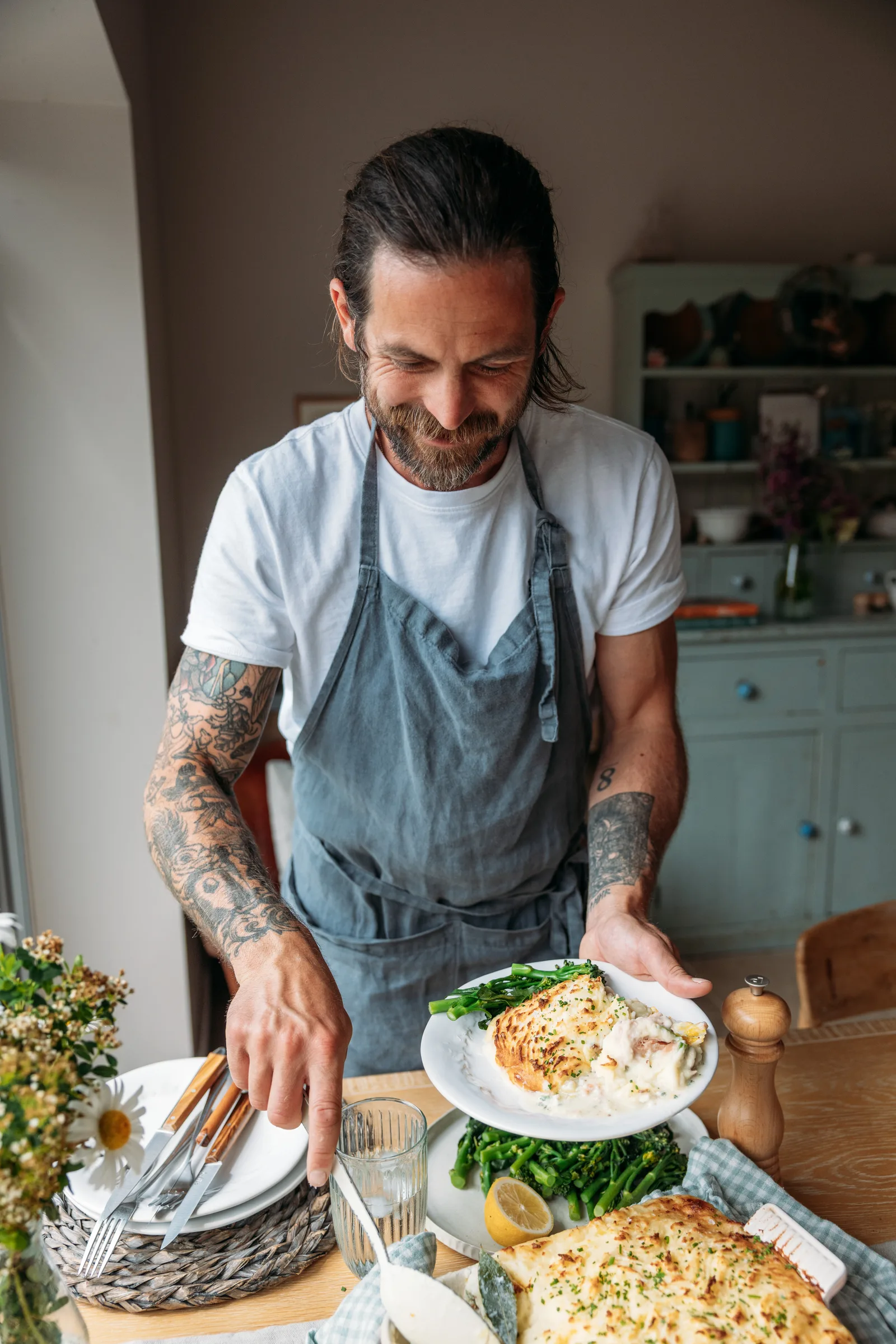 James Strawbridge plating a sustainable seafood fish pie during a Marine Stewardship Council social content recipe shoot in Cornwall
