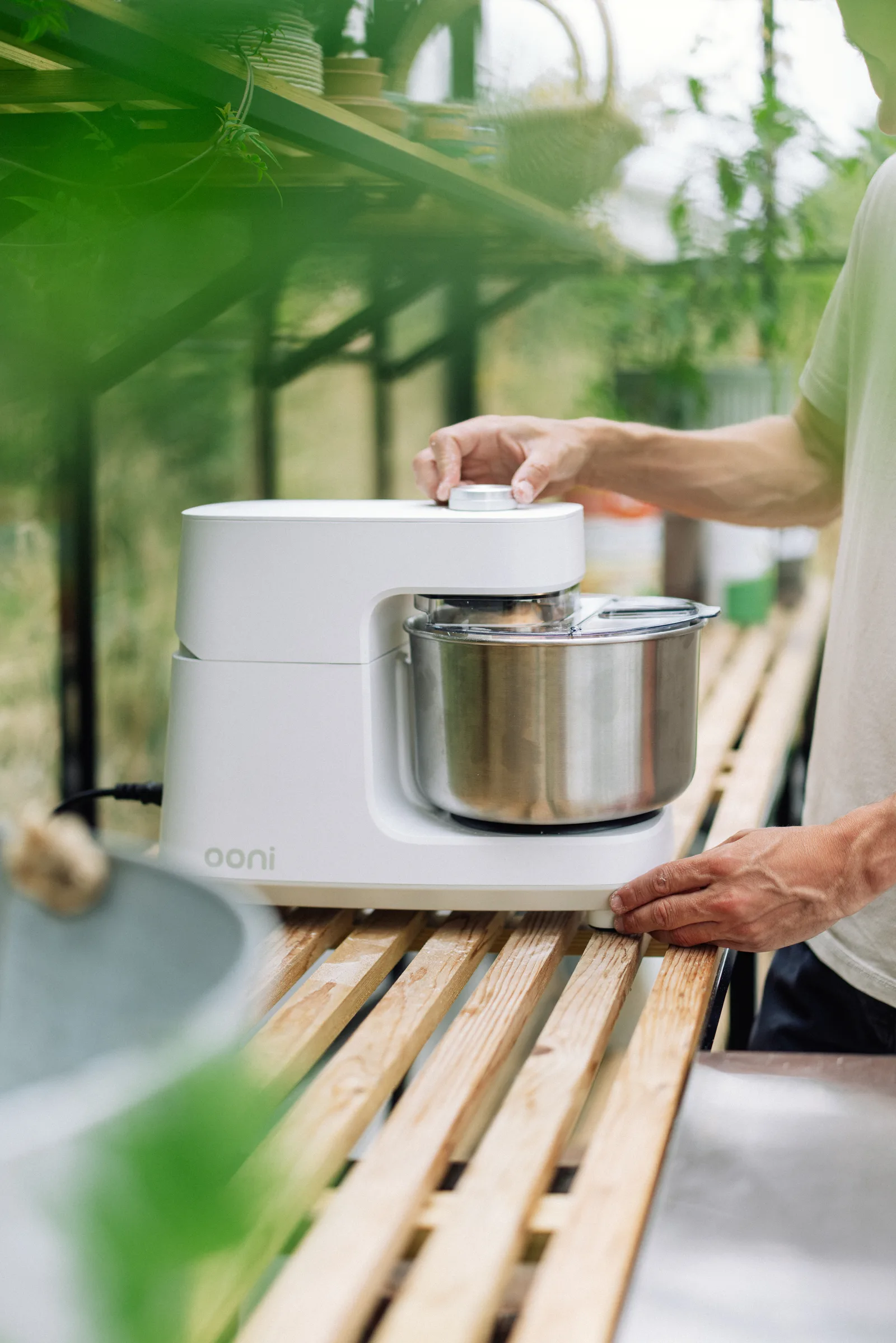 Grant Batty using an Ooni mixer during an Ooni pear and ricotta recipe video production shoot